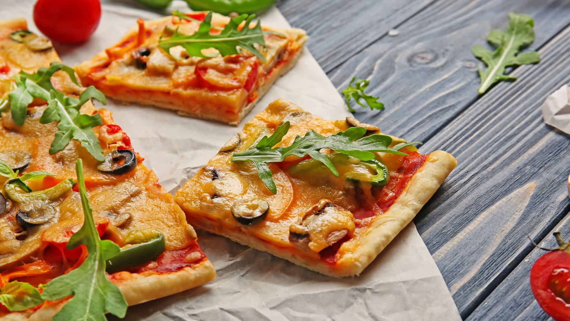 Slices of 'pizza al taglio', Roman-style square pizza.