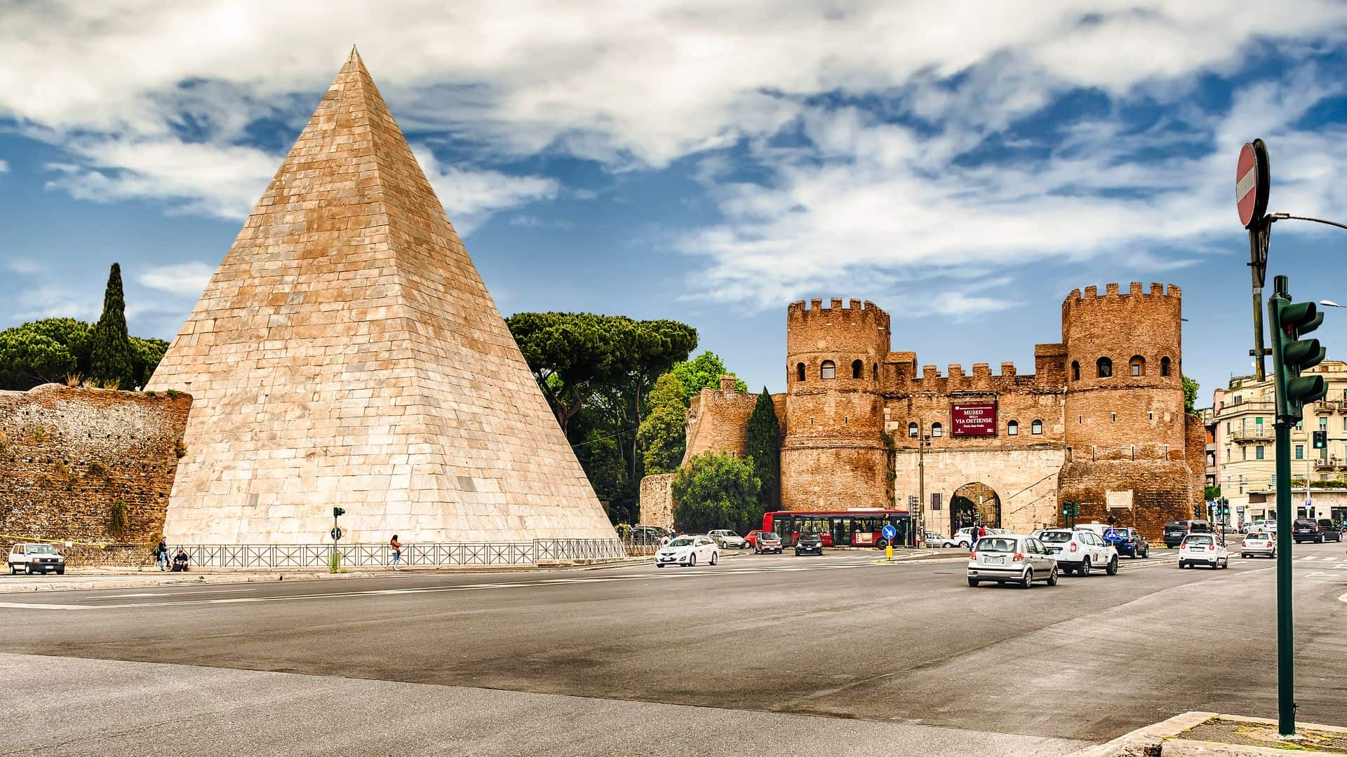 Street view of the Pyramid of Cestius and the Porta San Paolo.