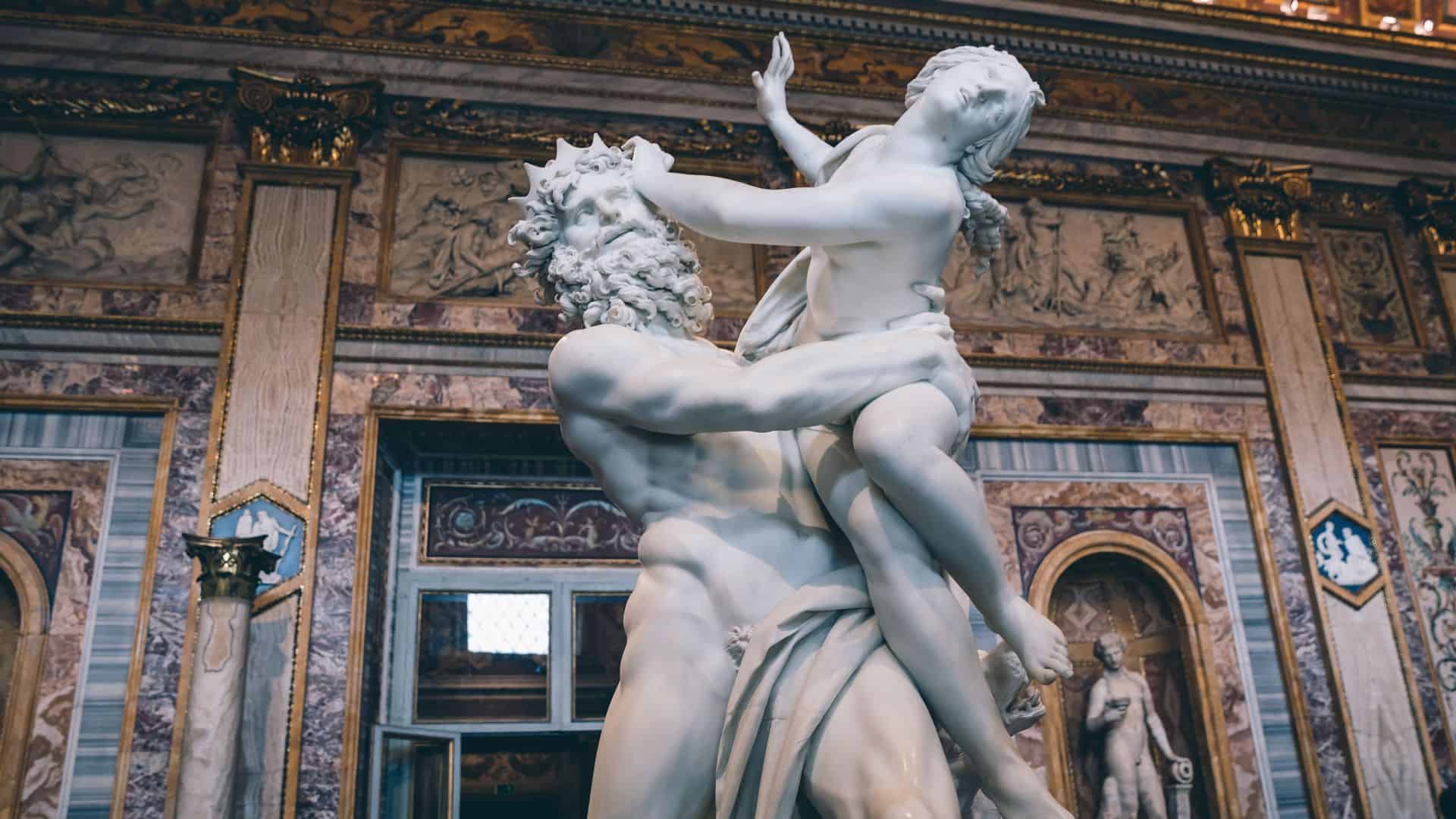 Bernini's "Rape of Proserpina" statue located inside the Borghese Gallery.