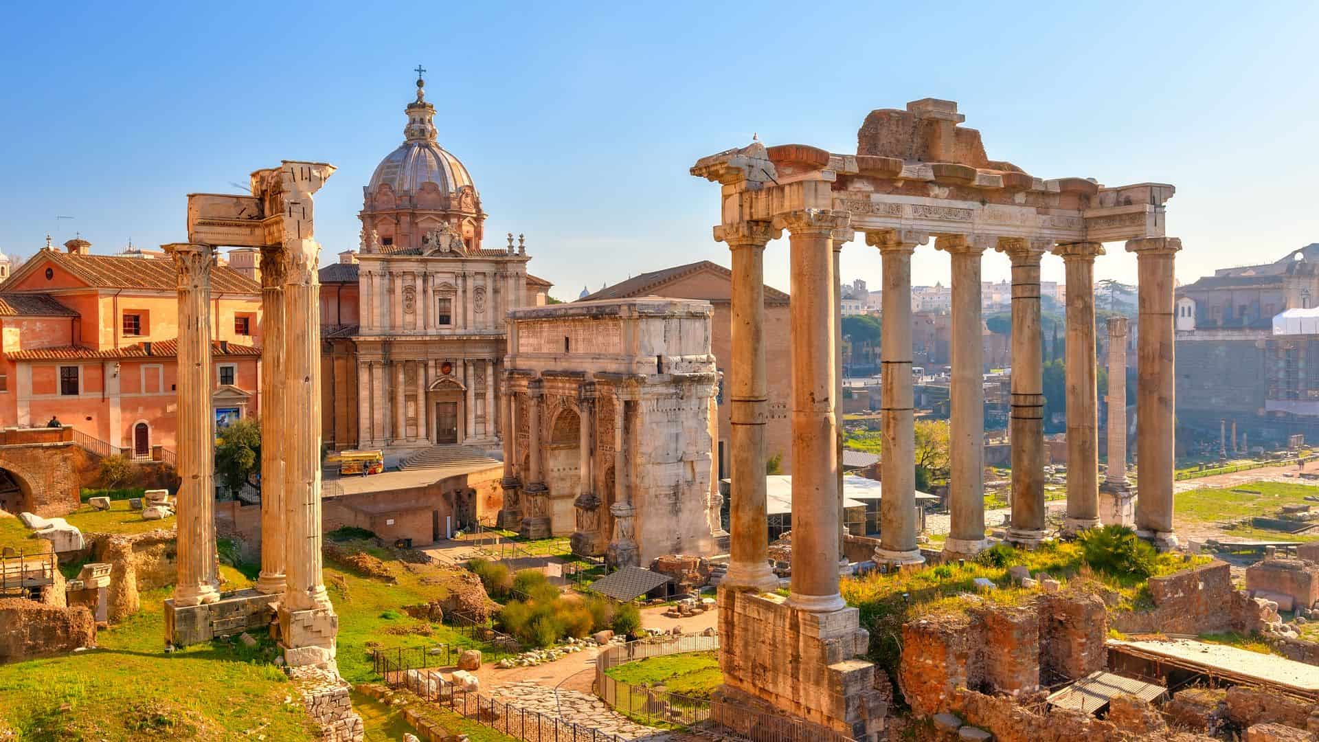 View of the Roman Forum, featuring the Arch of Septimius Severus in the center and the Temple of Saturn on the right.