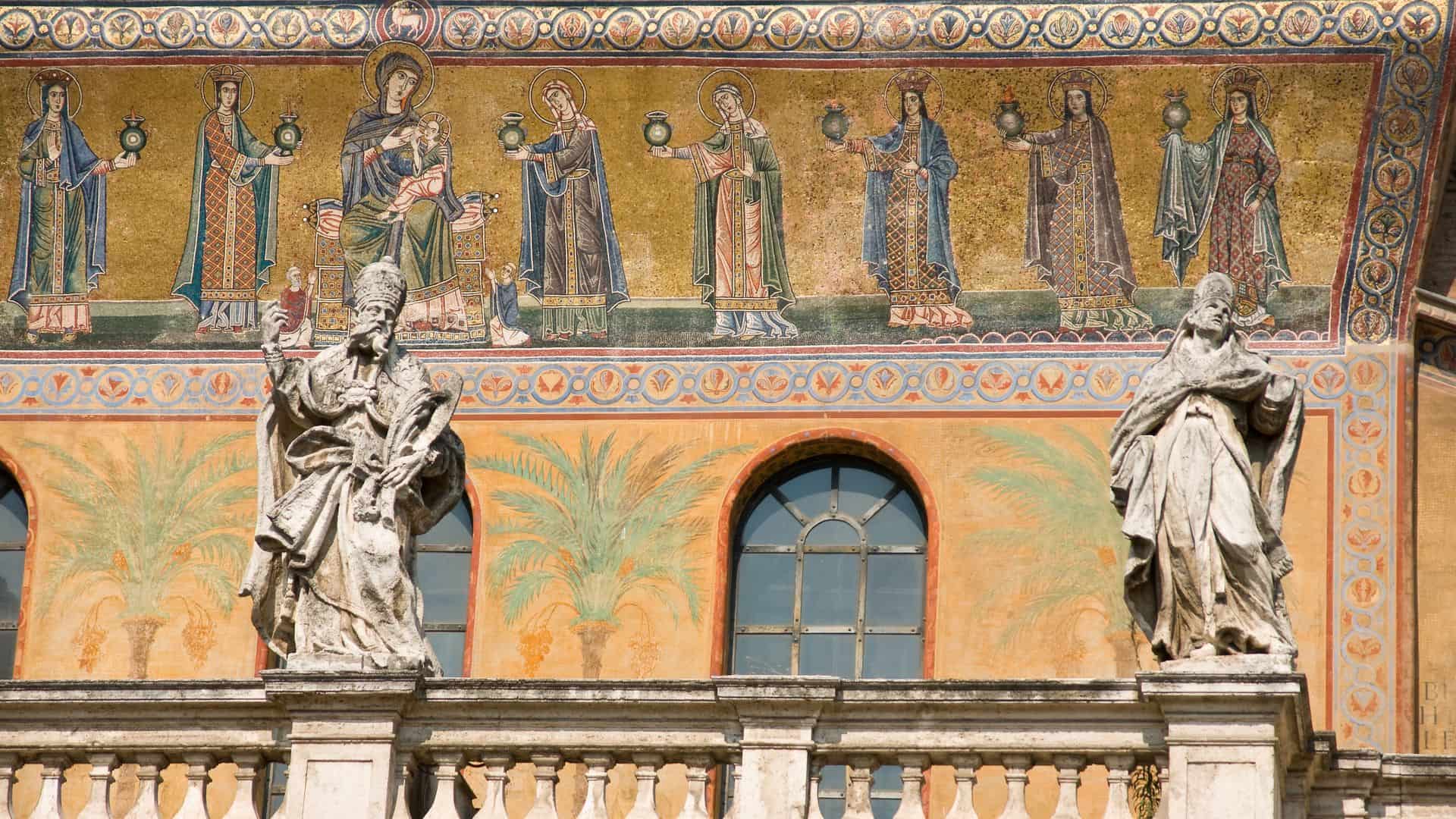 The golden mosaic facade of Santa Maria in Trastevere.